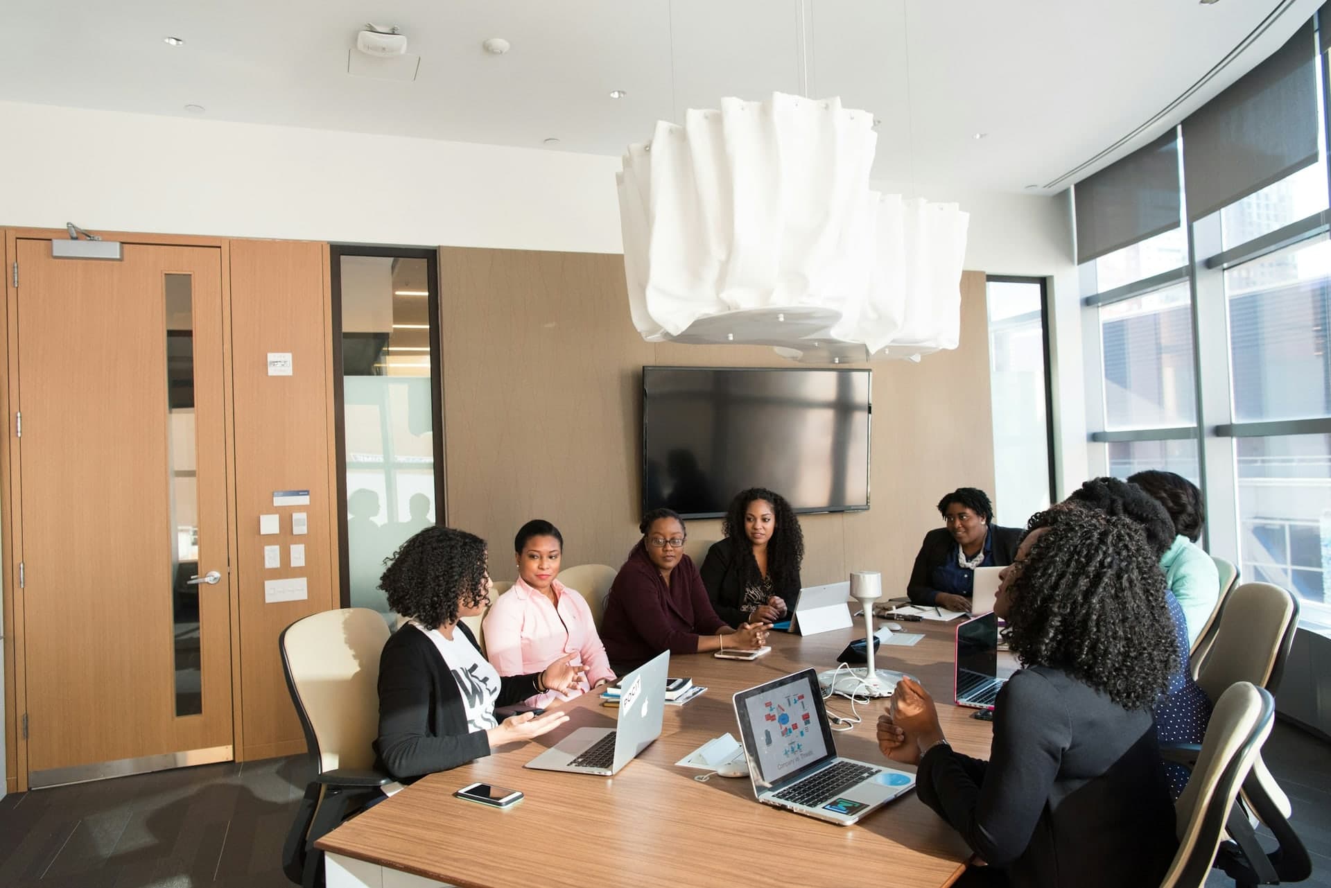 Students in an investment committee session